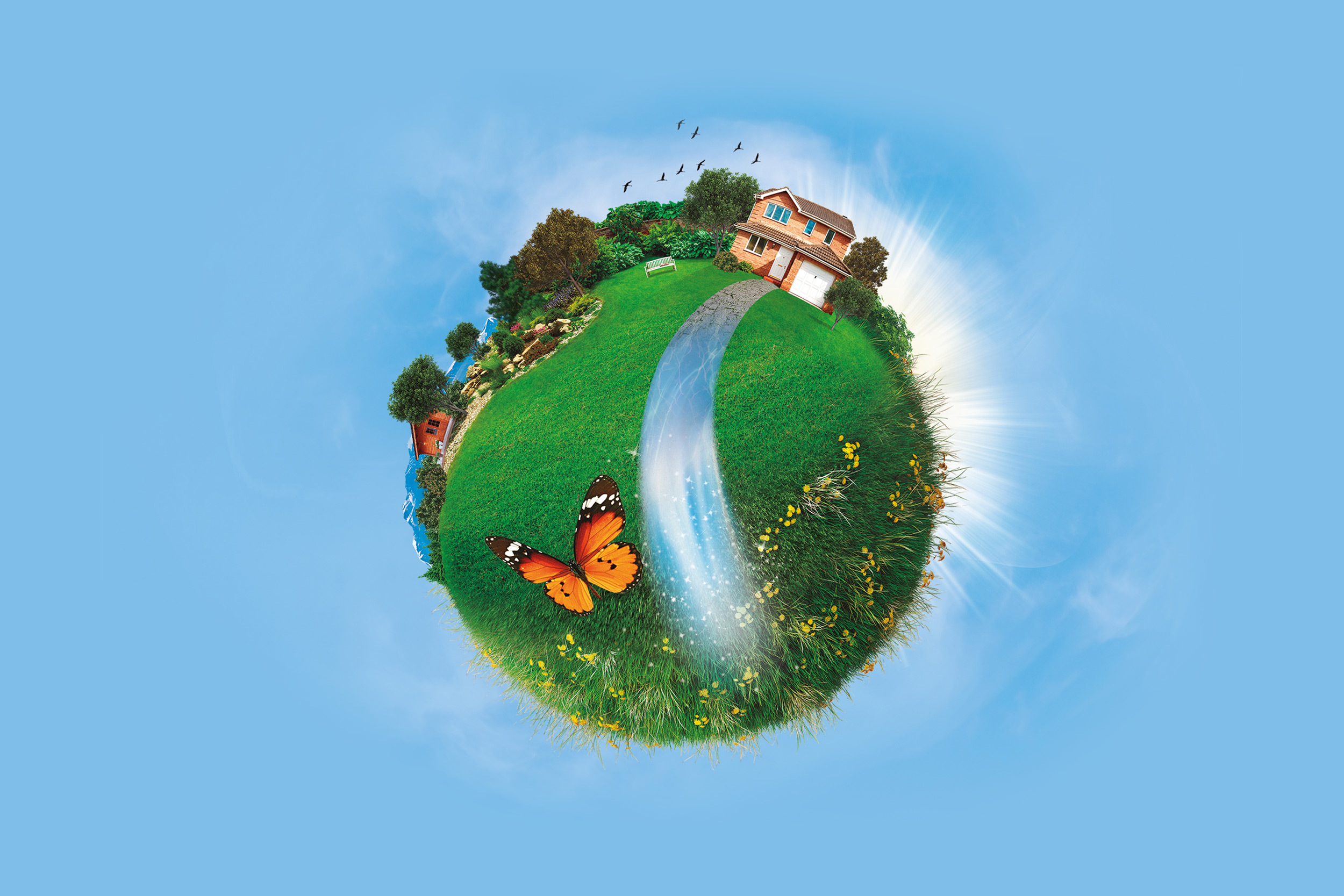 Bola del mundo esquematizada con un jardín con césped verde y árboles, casas y animales